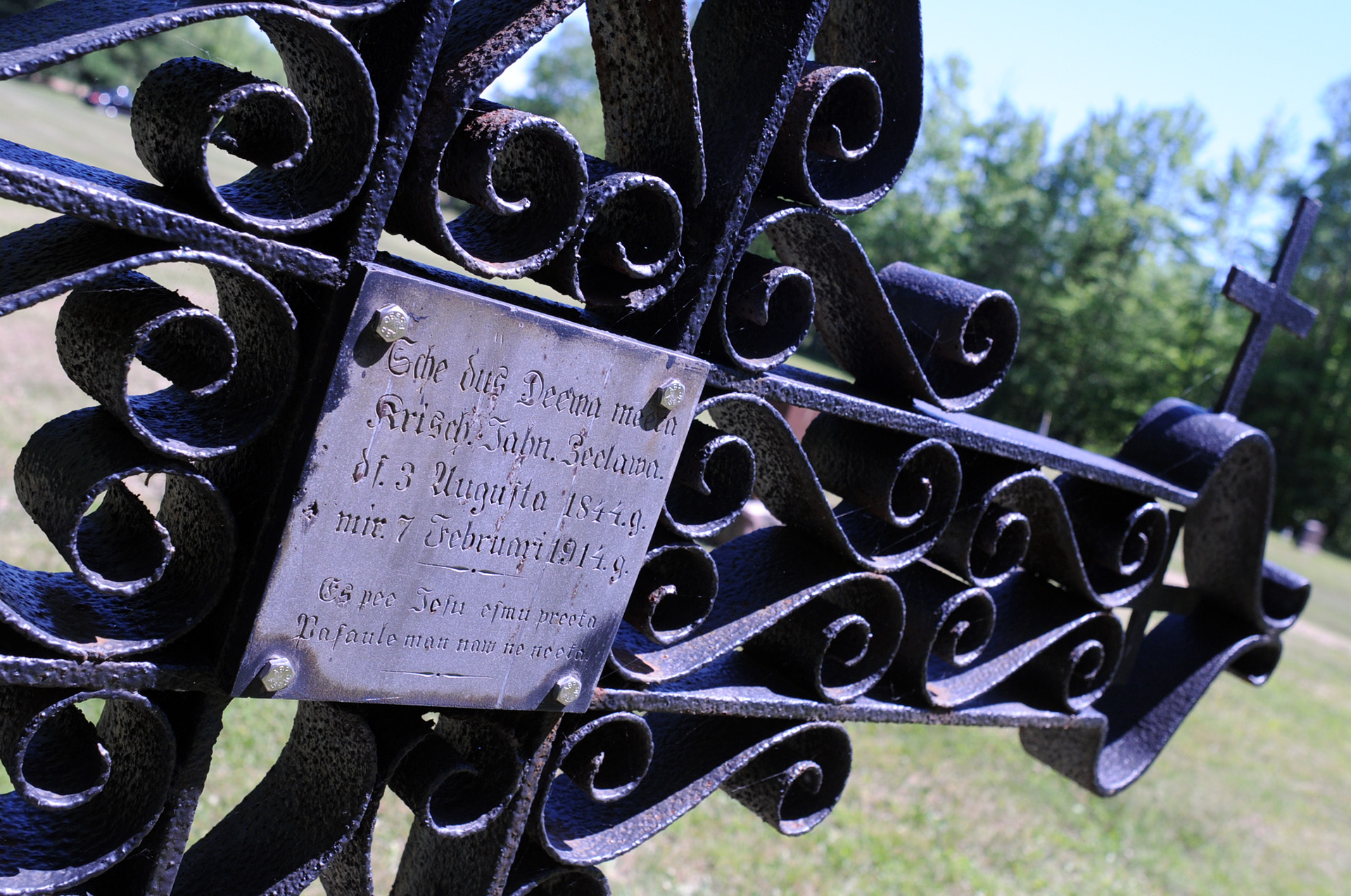 The grave marker for Krišjānis Jānis Cielava (1844-1914) is made of wrought iron and is unusual for the Latvian cemetery in Lincoln County.